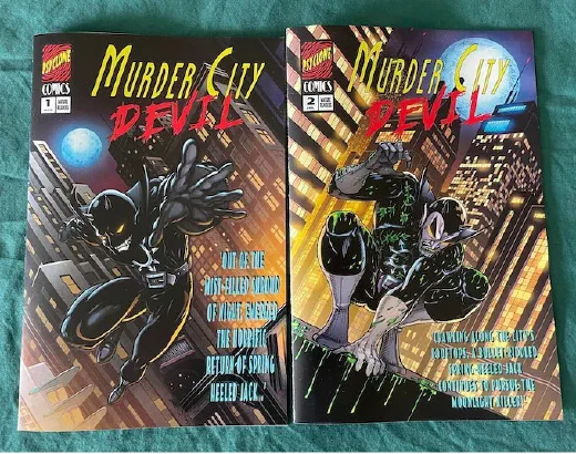 Murder City Devil issues one and two, laid out on grass